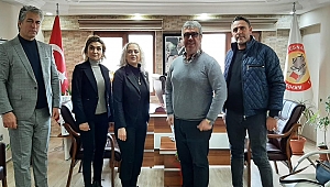 Memleket Partisi Manisa İl Başkanı Gülnur Efe Akhisar Kahveciler Odası Başkanı Erkin Güney ziyarette bulundu